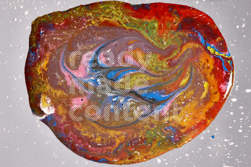 Close-ups of assorted colors blending on a grey background