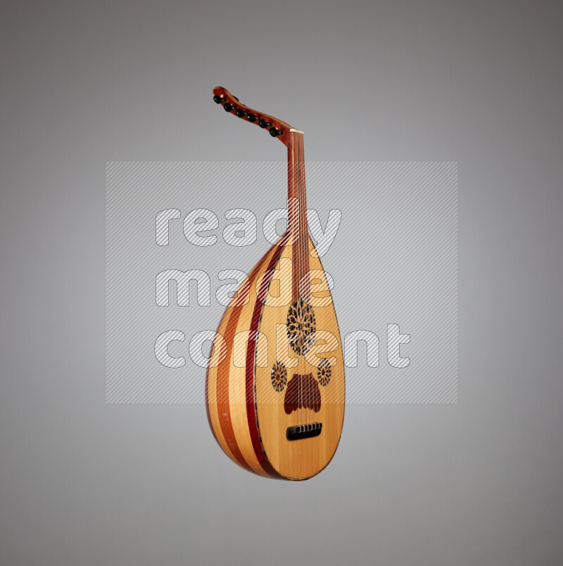 a wooden brown Oud on a gray background
