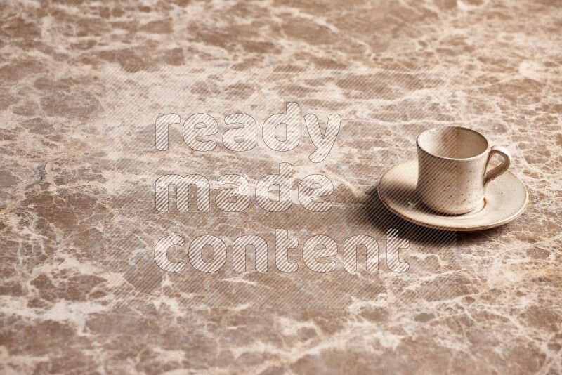Pottery Cup on Beige Marble Flooring