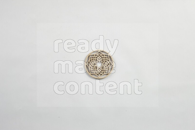 Crafted wooden coasters on white background