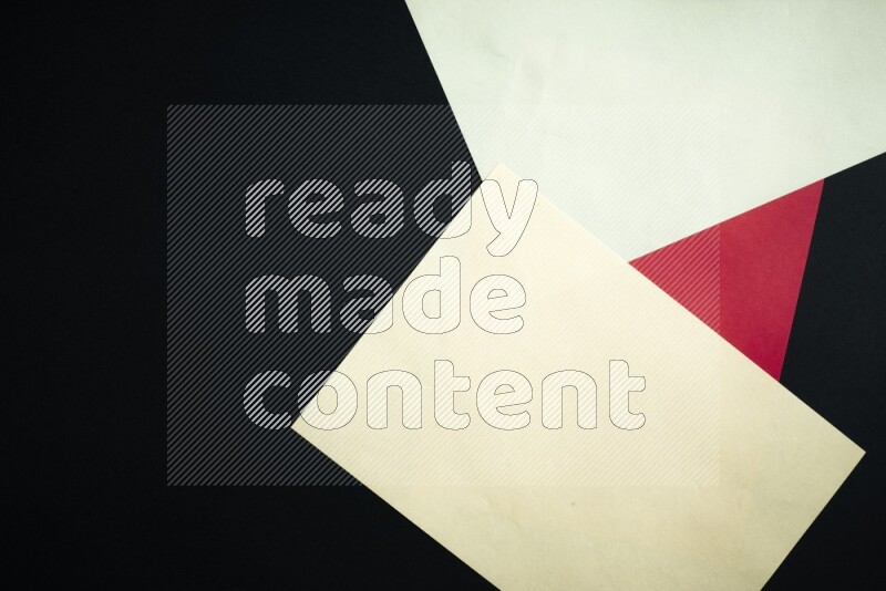 Multicolored paper sheet on black background