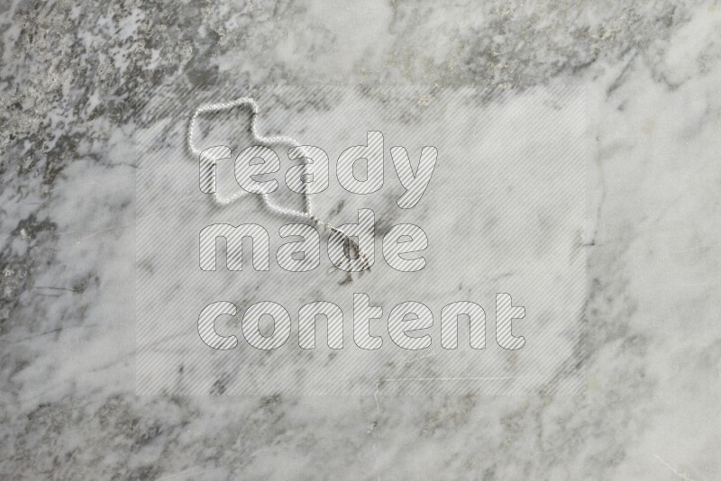 A prayer beads placed on grey marble background