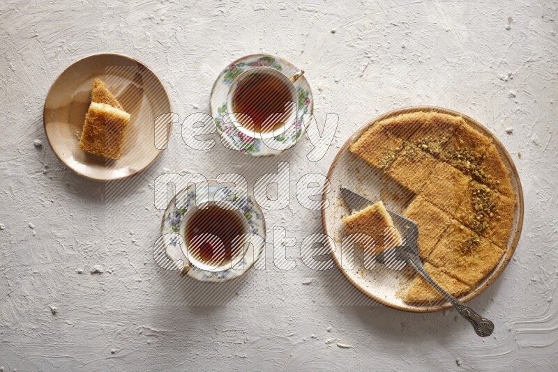 Konafa with tea in a light setup