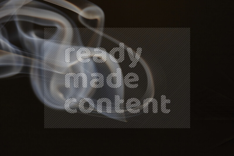 Motion of wavy smoke isolated on dark background