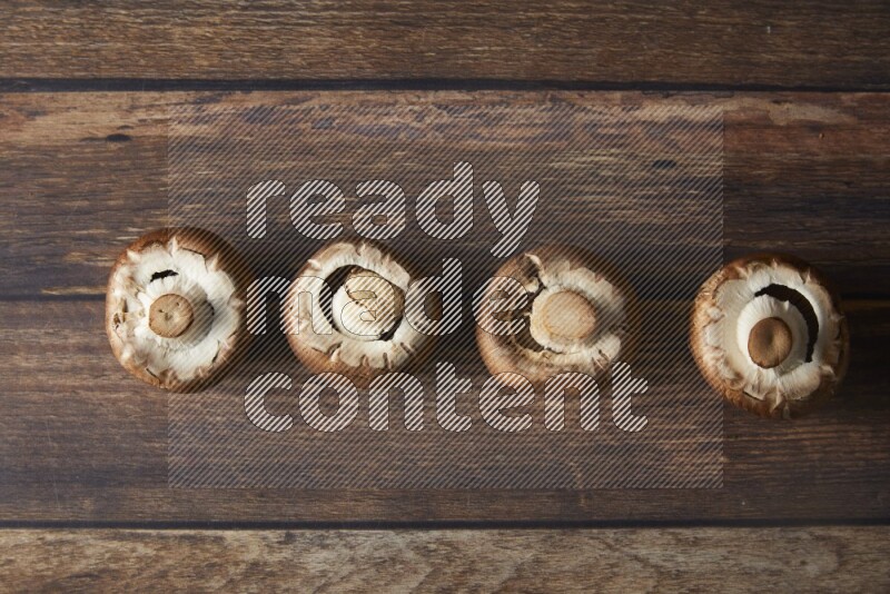 small fresh Cremini mushrooms topview  on wooden  background