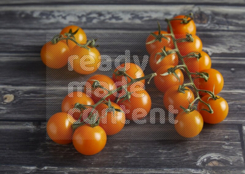 45 cherry tomato vein on a textured grey wooden background