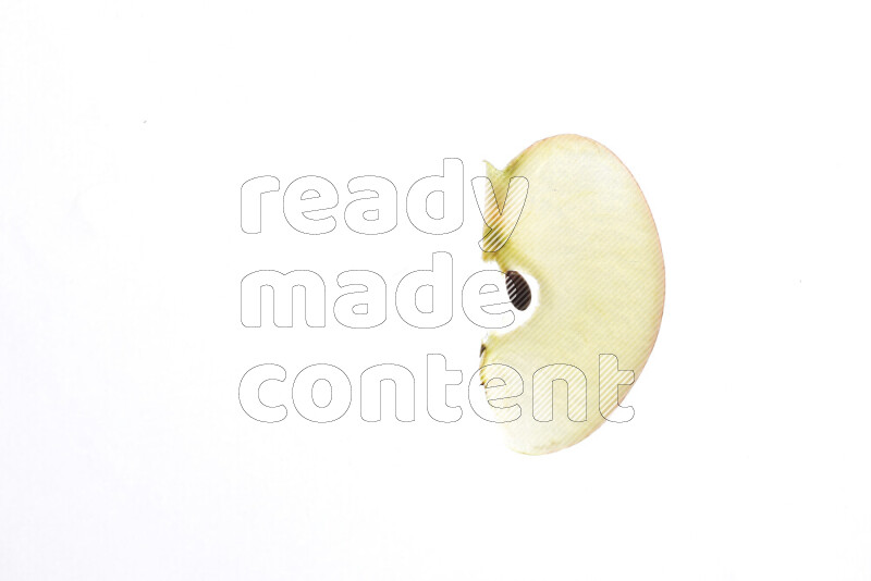 Apple slices on illuminated white background