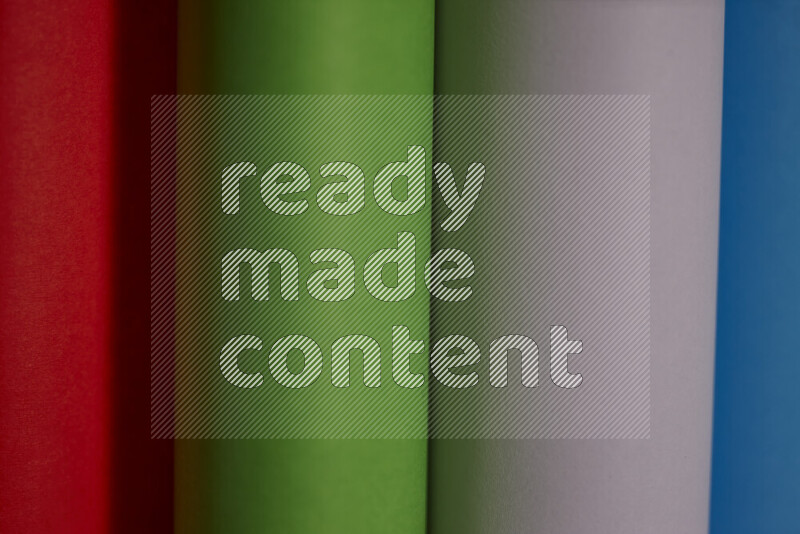 An abstract art showing colorful paper sheets arranged in an overlapping curves