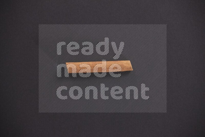 Cinnamon stick on black background