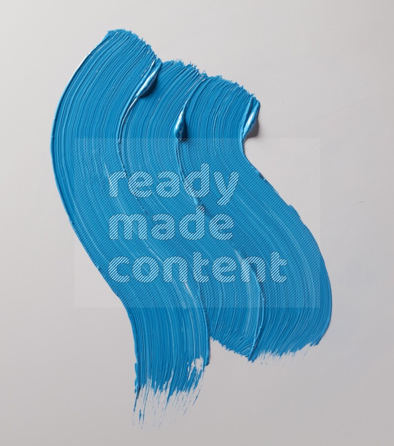 Multi blue curved brush strokes shaped into different shapes on a white background