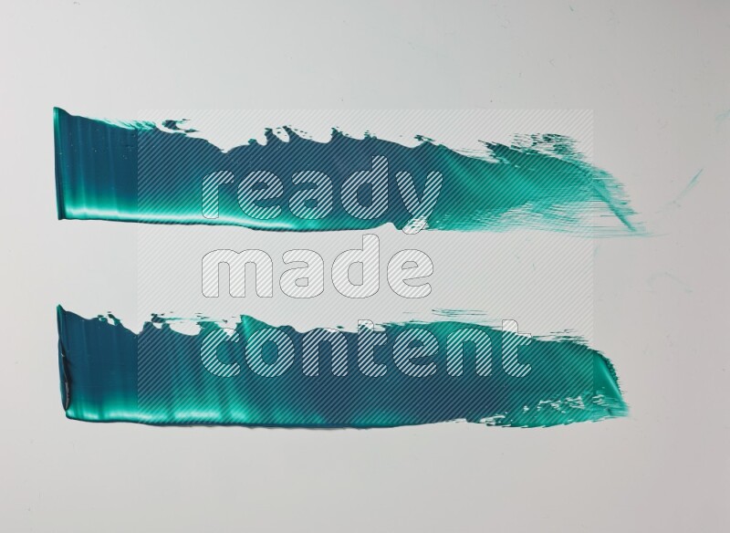 Turquoise painting knife strokes on white background