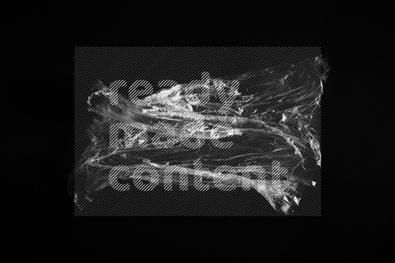 Transparent plastic textures on black background
