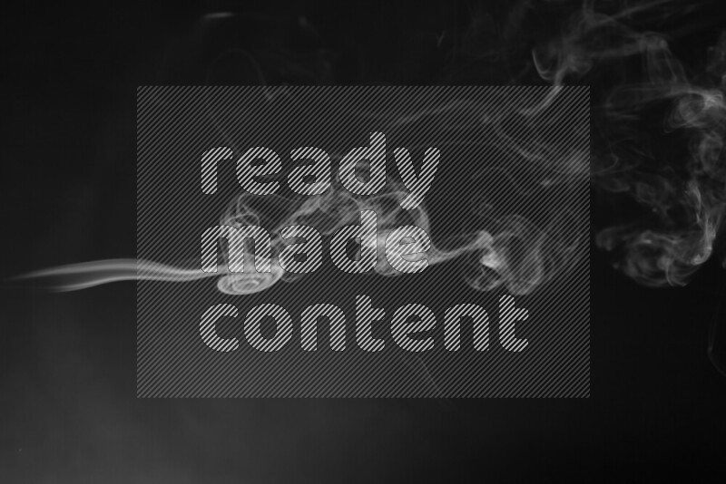 Motion of wavy smoke isolated on dark background