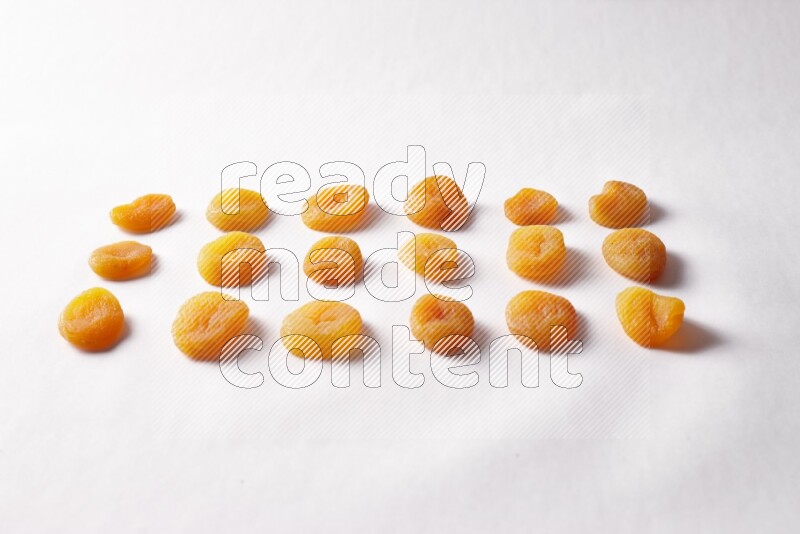 Dried apricots on white background