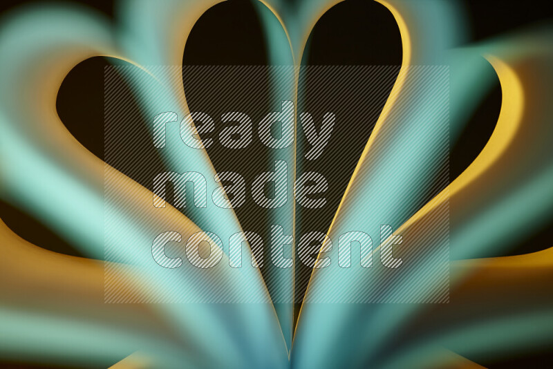 فن تجريدي يعرض منحنيات وتدرجات اللون الأصفر والأخضر مكونه بضوء ملون