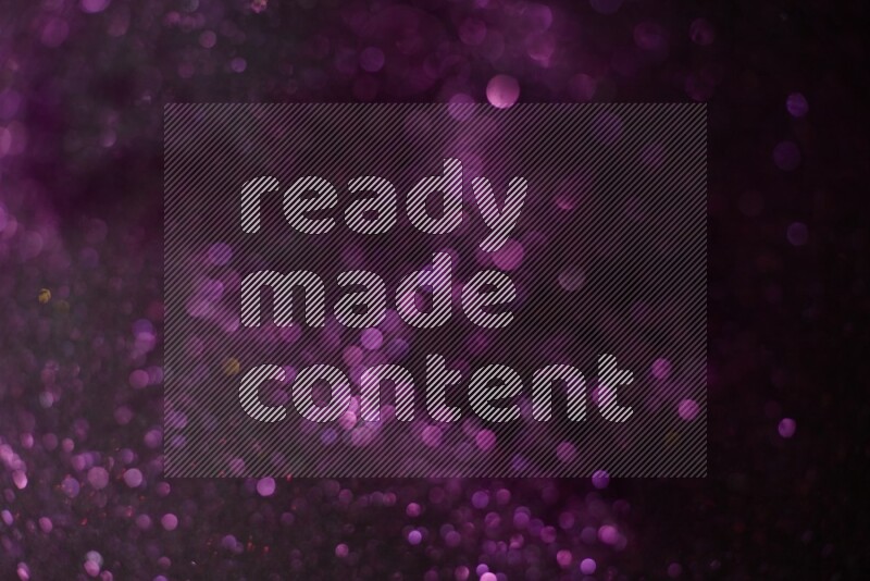 Pink glitter powder isolated on black background