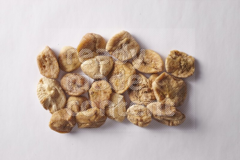 Dried figs on white background