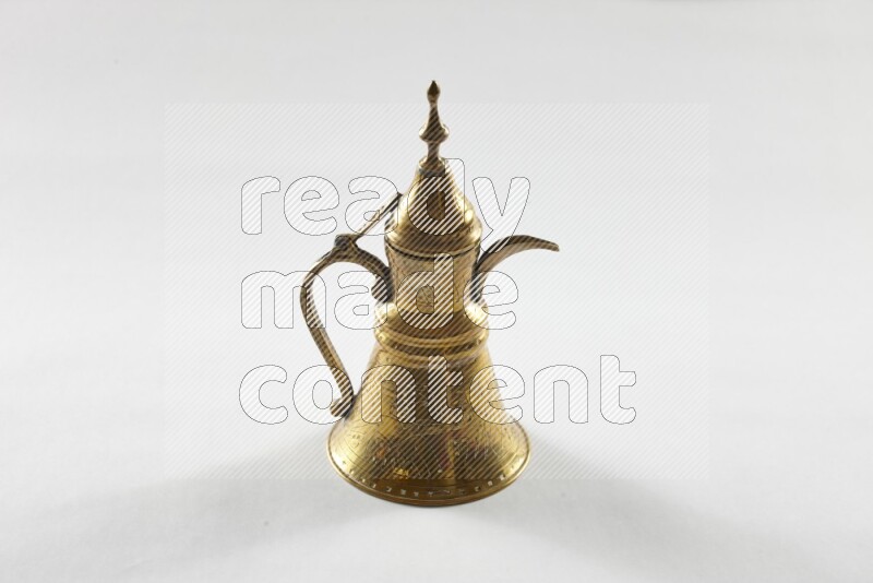 A metal turkish pot for coffee on white background