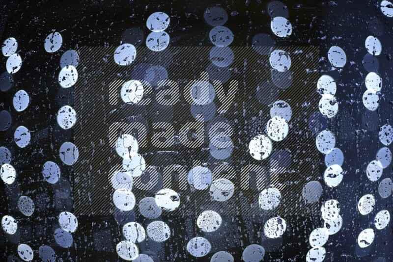 Bokeh light in white with water drops