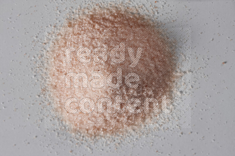 A bunch of fine himalayan salt on white background