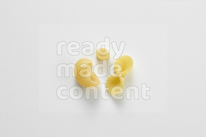 Different pasta types on white background