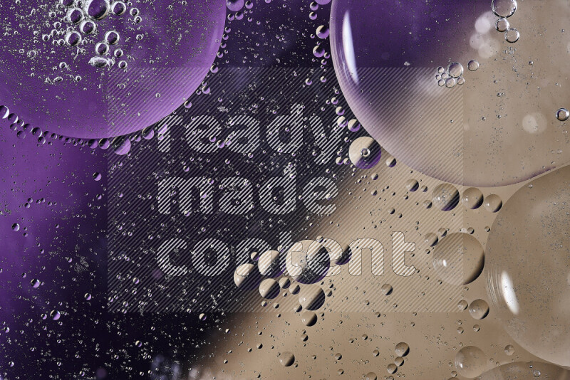 لقطات مقربة لفقاعات من الزيت على سطح الماء باللون الأرجواني والبني