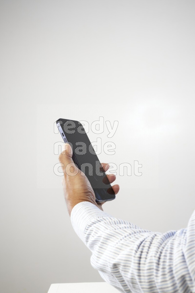 Male hand holding Smart phone on White background