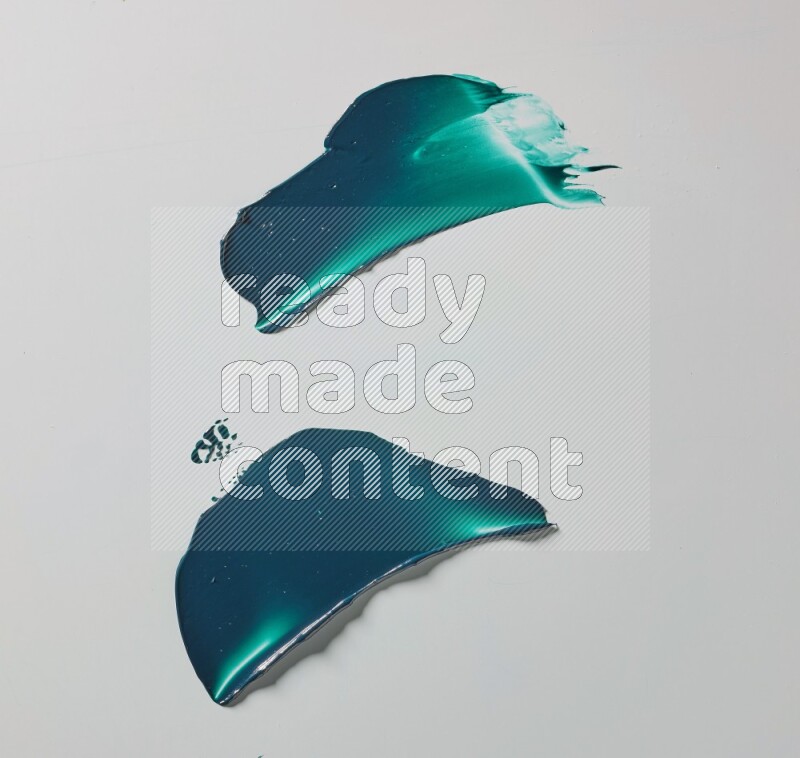 Turquoise curved painting knife strokes on white background