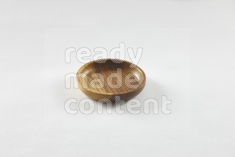 A wooden bowl on white background