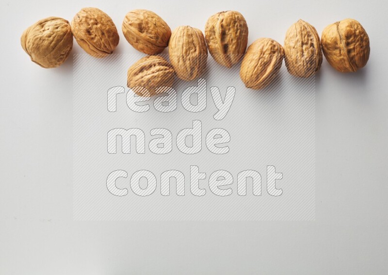 Top-view shot of walnut on white background
