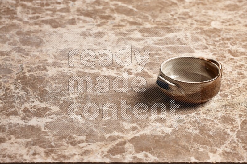 Multicolored Pottery Bowl on Beige Marble Flooring