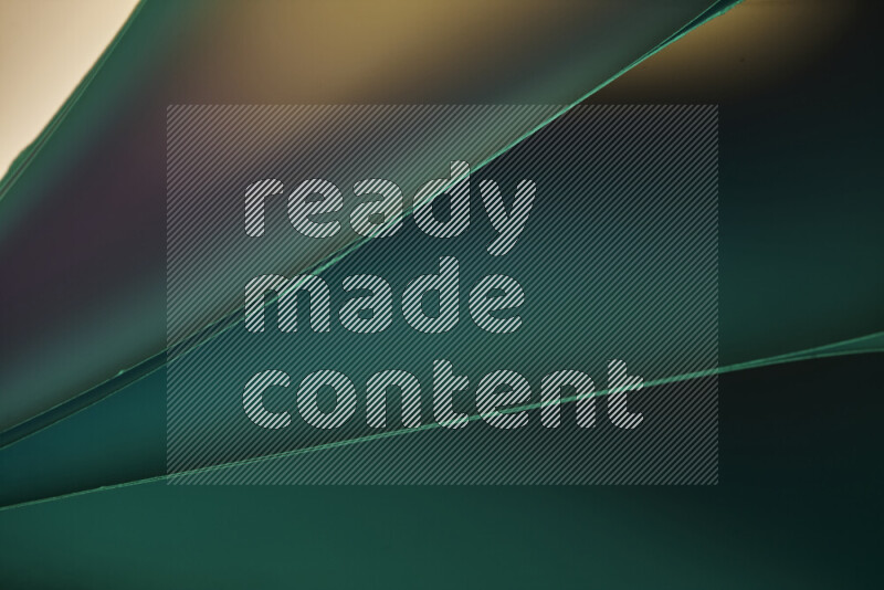 فن تجريدي يعرض منحنيات مع تدرجات الألوان الدافئة والباردة مكونه بضوء ملون