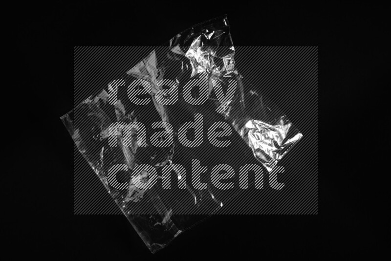 Transparent plastic textures on black background