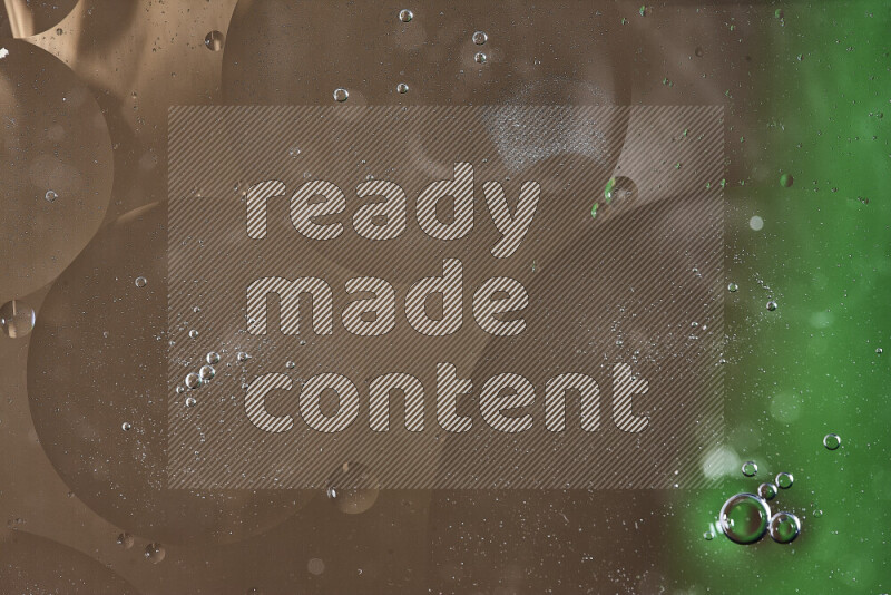 لقطات مقربة لفقاعات من الزيت على سطح الماء باللون الأخضر والبني