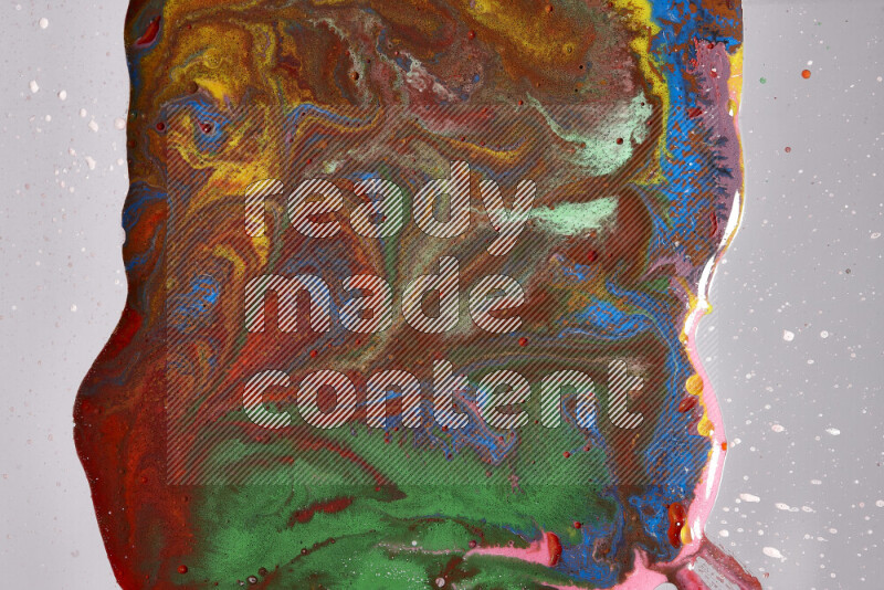 Close-ups of assorted colors blending on a grey background