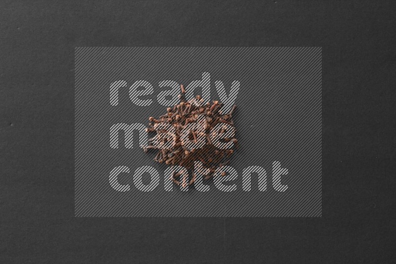 Cloves on a black flooring