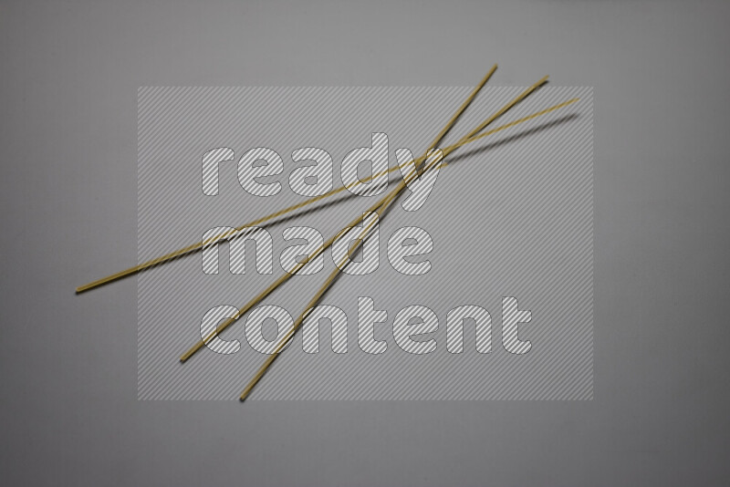 Spaghetti pasta on grey background