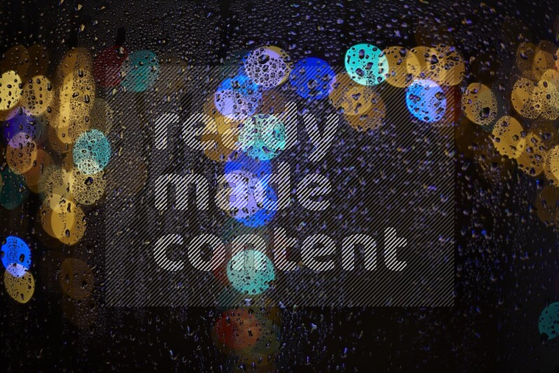 Bokeh light in multicolor with water drops