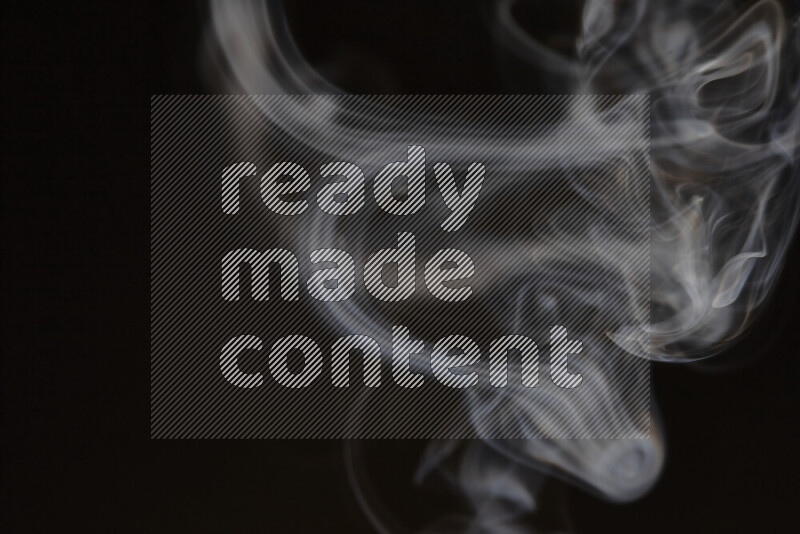 Motion of wavy smoke isolated on dark background