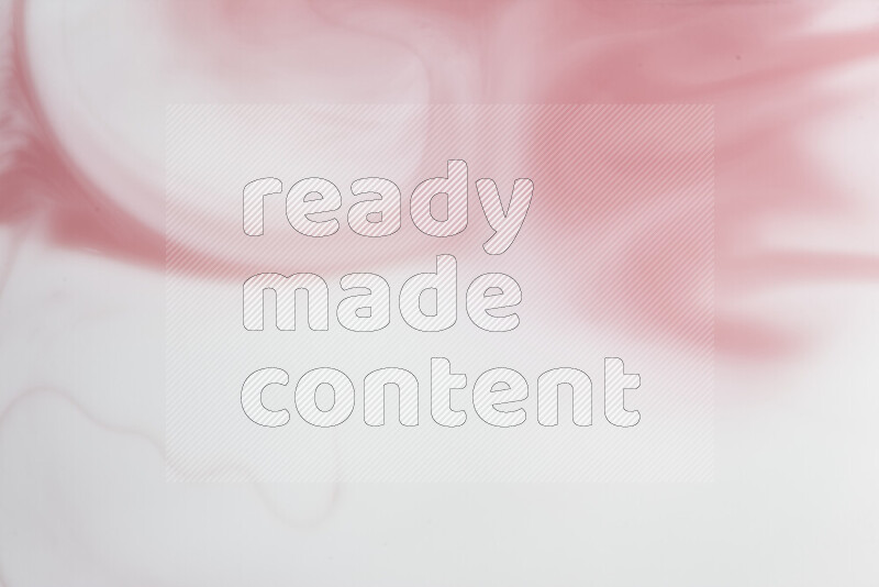 A close-up of abstract swirling patterns in red and white