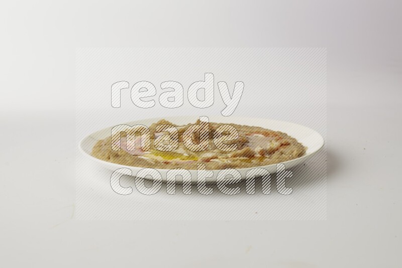 fava bean in a white plate direct on a white background