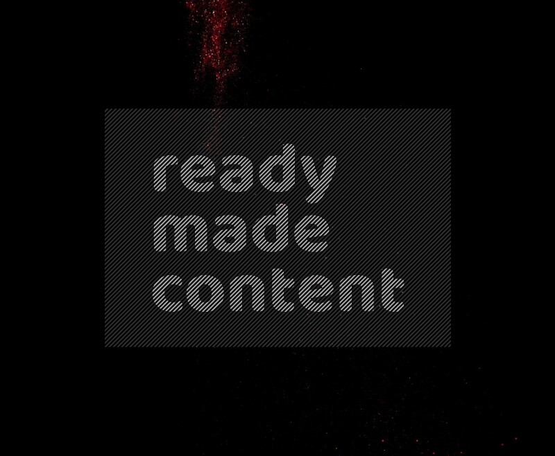 Red glitter powder isolated on black background