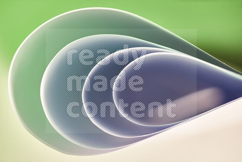 An abstract art of paper folded into smooth curves in green gradients