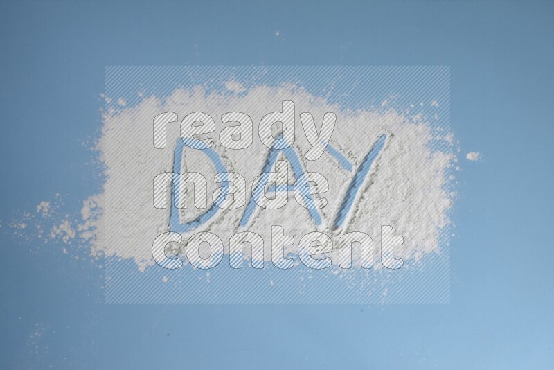A word written with white powder on blue background