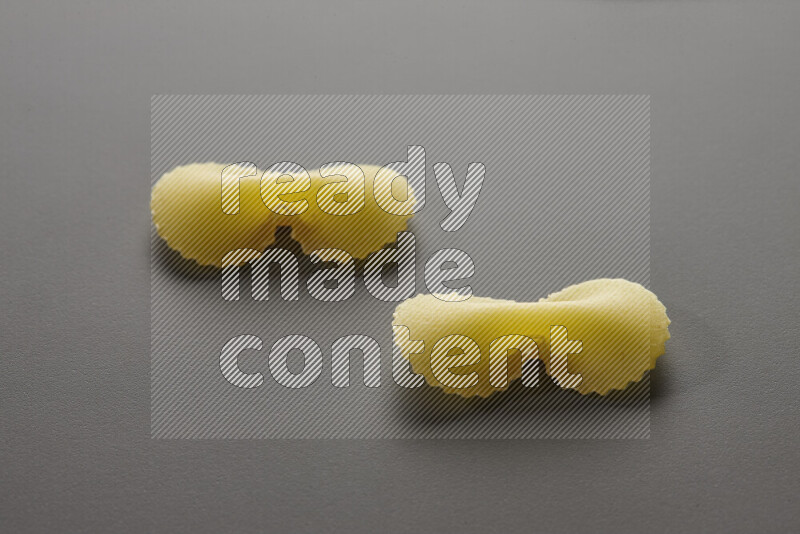 Fiocchi pasta on grey background