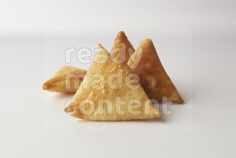 sambosas on a white background