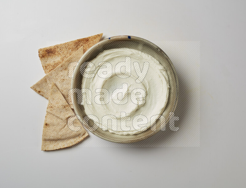 Plain Lebnah  in a grey pottery plate on a white background