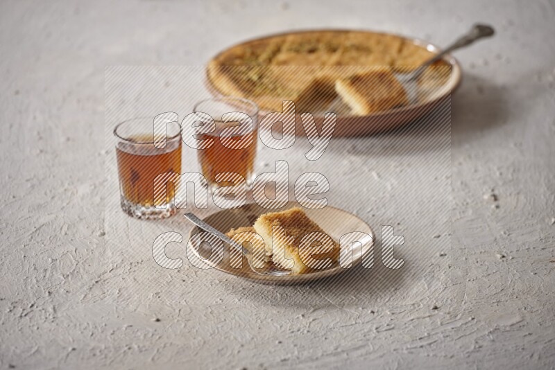 Konafa with tea in a light setup