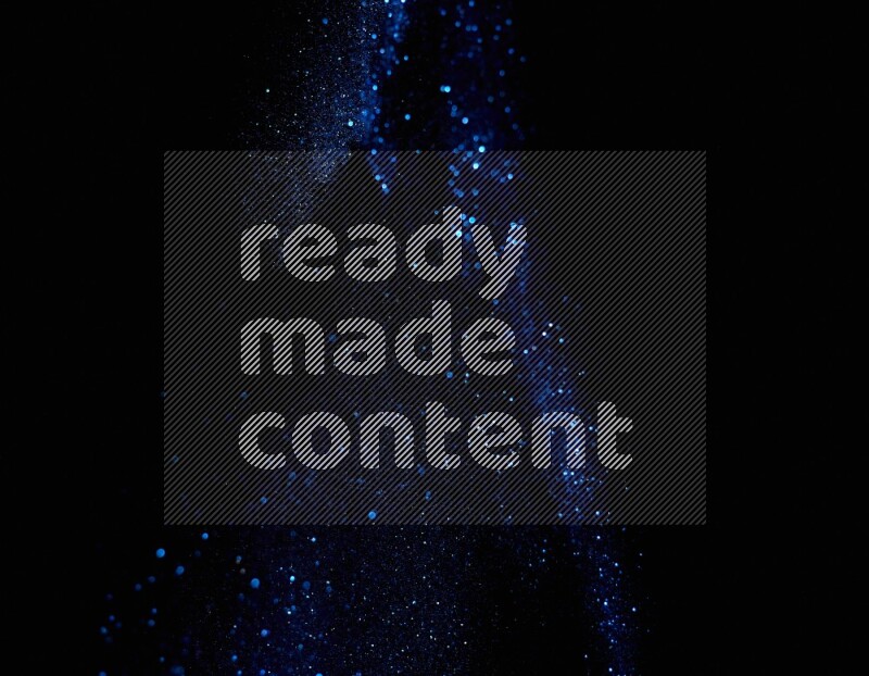 Blue glitter powder isolated on black background