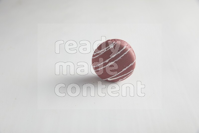 45º Shot of Red Poppy Flower macaron on white background